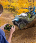 Child using controller to operate Halo Infinite RC Battle Hog UNSC Warthog with Master Chief and Spartan in autumn forest