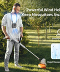 Man using 10000mAh Portable Waist Clip On Fan With 5 Speeds And Built In Flashlight, Hands Free Belt Personal Cooling in garden