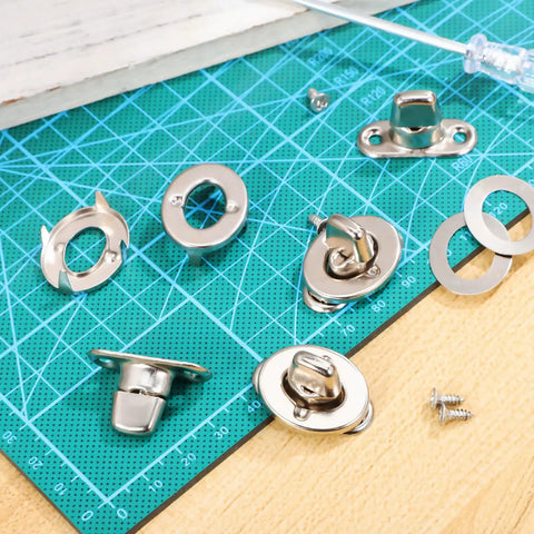 Built Tough Galvanized Turn Button Fasteners Twenty Pack Twist Lock Hardware detail on cutting mat for outdoor projects.