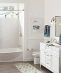 Modern bathroom with white vanity, blue accents, and Sage Traditional Double Post Toilet Paper Holder Brushed Nickel Finish installed.