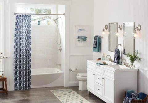 Modern bathroom with white vanity, blue accents, and Sage Traditional Double Post Toilet Paper Holder Brushed Nickel Finish installed.