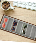 Slick Wooden Sunglasses Display Plate Featuring Seven Grid Slots For Eyeglasses Organization durable desktop holder stand on wooden desk with sunglasses.