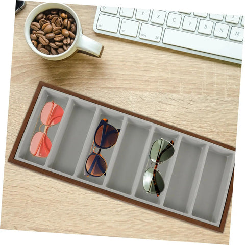 Slick Wooden Sunglasses Display Plate Featuring Seven Grid Slots For Eyeglasses Organization durable desktop holder stand on wooden desk with sunglasses.