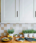 White kitchen cabinets with 30 Pack Solid 5 Inch Square Cabinet Handles Oil Rubbed Bronze Drawer Pulls for modern look.