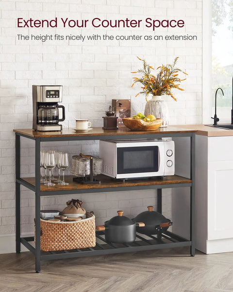 Industrial Kitchen Island Featuring Three Tier Storage And Generous Worktop, Rock Solid Steel Frame Built For Real Life Messes, Rustic Brown And Black Finish, Zero Sweat Quick Setup For Any Space with coffee maker and microwave.