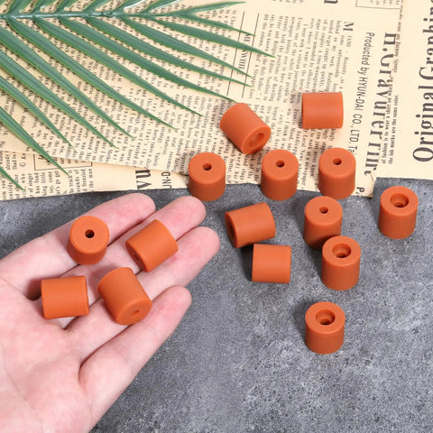 16 Pcs 3D Printer Heat Bed Leveling Parts Set With Heat Resistant Silicone Buffers And Solid Bed Mounts displayed on a hand and surface