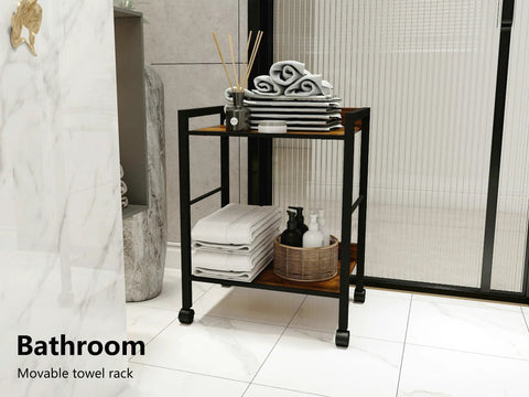 Bathroom scene with Two Tier Rolling Utility Cart With Brown Wood Shelves And Black Metal Frame On Wheels, styled with towels.
