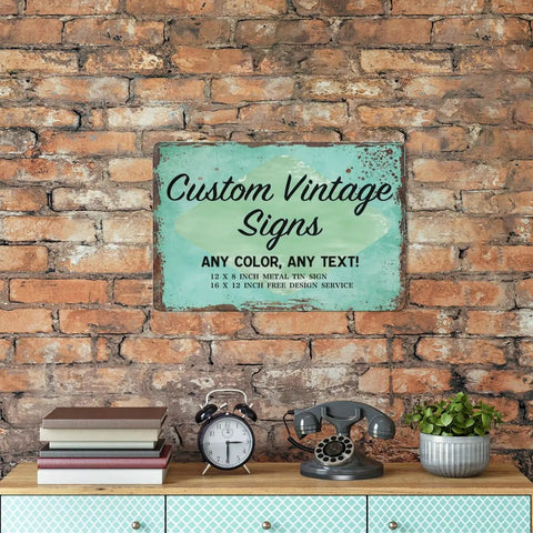 Customizable Metal Sign With Text Or Logo Made In USA for indoor home or office use, displayed on brick wall.
