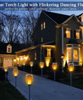 Solar Torch Lights With Flickering Flame For Outdoor Yards And Pathways lighting a driveway at night, easy ground stakes