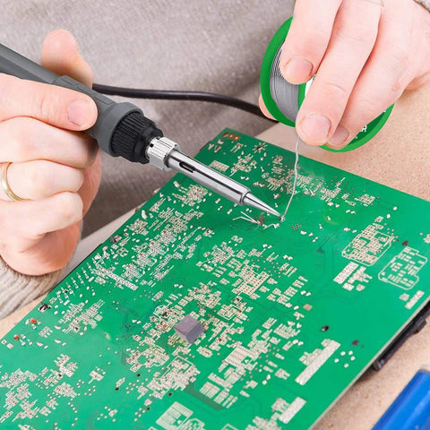 Person using 0.8mm Lead Free Solder Wire With Rosin Core 200g Spool For Electronics DIY Projects Sn Ag Cu Alloy on PCB