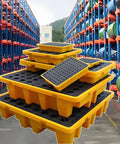 Heavy Duty Spill Containment Pallet for 1 to 4 Drums stacked, in a warehouse, 130 cm x 68 cm x 15 cm, yellow with leak-proof tray