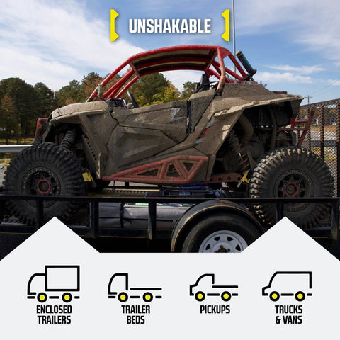 Auto Retractable Ratchet Straps 2 Pack 1 Inch By 10 Feet Beefy Heavy Duty Tie Down Straps securing an ATV on a trailer.