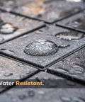 Five Gallon Clear Acrylic Paver Sealer Gives Concrete A Straight Up High Gloss Wet Look With Professional Grade Color Enhancing Formula That Dries Fast On Driveways Patios And Walkways For A Legit Pro Shine on wet paver surface with water droplets.
