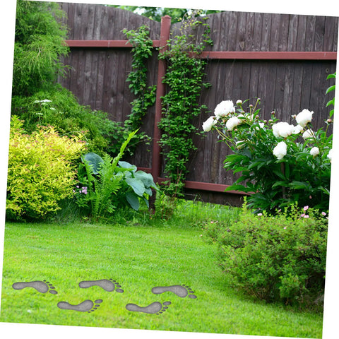 2 Pcs Reusable Paving Molds For Sidewalks And Garden Paths creating footprint designs in a garden lawn
