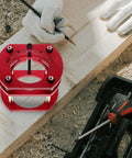 Getajghsd Iron Router Table Lifting System Base for Precision Slotting, red metal base on wood, used for milling work.