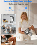 Woman pouring water from detachable glass pitcher of Instant Hot Reverse Osmosis Countertop Water Filter, 40oz capacity