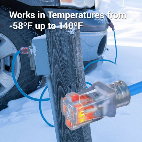 Orange 16 Gauge 3 Prong Grounded Extension Cord 100 Ft Heavy Duty Outdoor Power Cable with lit connector in snow