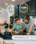 LED Pendant Light Fixture With Black And Gold Rings in modern cafe setting over counter scene