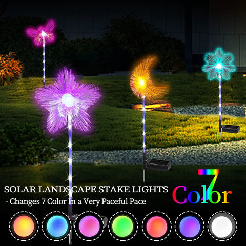 Colorful Solar Garden Stake Lights 4 Pack With RGB Color Changing LEDs illuminating pathways, showcasing seven color modes.