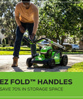 Person folding EZ Fold handles of 80V 21 Inch Self Propelled Cordless Lawn Mower With Brushless Motor LED Lights 4.0Ah Battery.