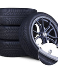Close-up of TR-416-S metal valve stem, 1-inch outer mount, on alloy wheel with four tires in background.