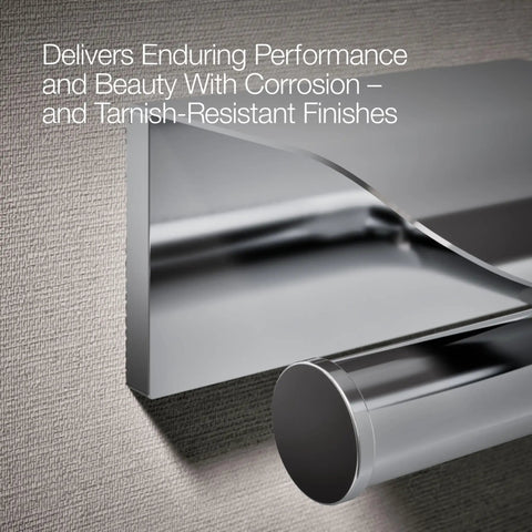 Vertical Toilet Paper Holder From Avid Collection with polished chrome finish, close-up of sleek metal build, wall mount visible.