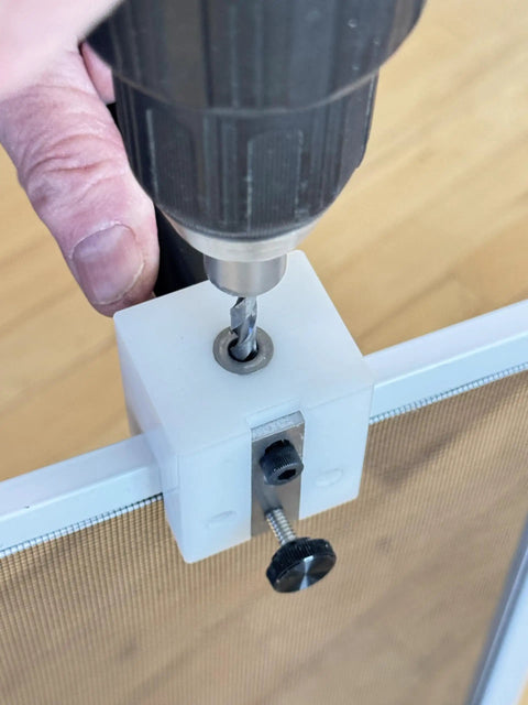 Pro Grade Window Screen Pin Plunger Jig Tool Drills Smooth Straight Holes Every Time No Sweat in use with a drill.