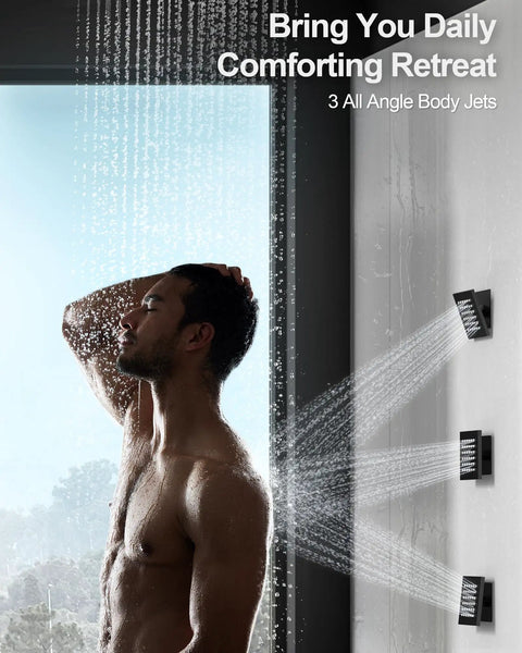A person enjoying the GRANDJOY 20" LED Shower System with Handheld Spray, Matte Black, featuring three angle body jets.