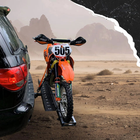 Anti-Tilt Motorcycle Hitch Carrier With 73 Inch Ramp And 47 Inch Dirt Bike Loading Ramp For Fat Tire E-Bikes Fits 2 Inch Receivers Weatherproof Heavy Duty Steel carrying a dirt bike on SUV.