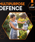 Woman wearing a White Disposable Aprons 300 Pack Individually Wrapped Waterproof Polyethylene 1 Mil Durable For Cookin, Food Prep, Cleaning And More 24 By 48 Inches Everyday Use while watering plants outdoors.