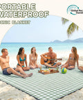 Group of people sitting on a Waterproof Extra Large Picnic Blanket 80x80 Inches For Beach And Outdoor Camping at the beach.