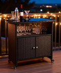 Outdoor Rolling Bar Cart With Storage Cabinet And Tempered Glass Top PE Rattan Grill Cart for Patio and BBQ, deck view