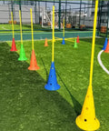 Agility Hurdle Cone Set With Detachable Slalom Poles, 5-Piece Training Kit on a grassy field with colorful cones