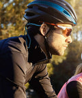 Cyclist wearing sunglasses and helmet with Glasses Strap For Men And Women Non Slip Clip Eyeglass Holder Around Neck Retainer Cord Lanyard Sports Sunglasses Strap With Universal Fit For Wide And Narrow Temples.