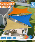 Outdoor patio with equilateral triangle shade sails in various colors above a seating area, showcasing design and installation.