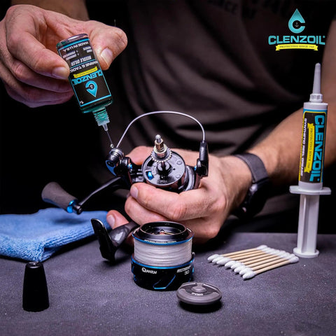 Marine Reel Care Kit With Oil And Grease For Freshwater And Saltwater Reels, showing oiler and grease syringe in use on fishing reel