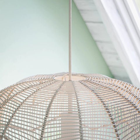 Close-up of White Rattan Pendant Light Snaggle One Light Large Ceiling Fixture For Vaulted Ceilings With Rattan Shade Adjustable Hanging 22.5 To 81 Inches 19.7 Inch Wide 25 Inch Tall Modern High Shine Showstopper Finish.
