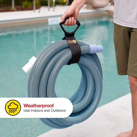 Person holding Heavy-Duty 28 Inch Storage Straps Set 2-Pack No-Fuss Hook And Loop Cord Carrier with hose by a pool.