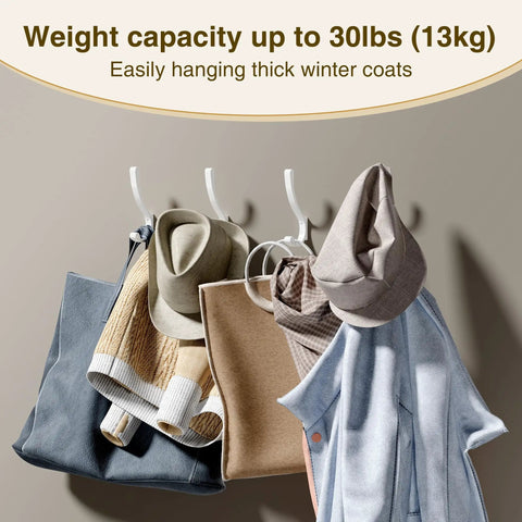 Heavy Duty Wall Mount Coat Hooks Set holding clothes and bags, metal hangers for strong 30 lb hold, white 4 pack organizer.