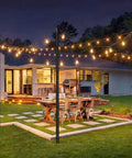 Patio with 2 Pack Outdoor String Light Poles 10.5 Ft Spiral Screw In Stakes for backyard bistro party and wedding lighting.