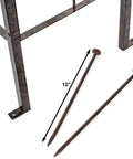 Close-up of ground spikes for Seven And A Half Foot Tall Iron Garden Obelisk Trellis For Climbing Roses Clematis And Jasmine