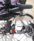 Close-up of EBike Hydraulic Disc Brake Set With Power Off Sensor, showing levers and calipers on handlebars and rotors on wheels.