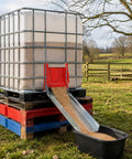 9X9 Heavy Duty Sliding Grain Gate Built Tough For Barns And Ibc Totes in use with grain flowing into a bin.