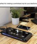 UltraPro 10 Outlet Surge Protector With USB Charging And Two USB Ports 2880 Joules 4 Foot Cord Black on desk with plugs