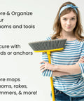 Woman holding broom with instructions for Ten Pack Wall Mount Organizing Spring Clamps For Tools, Rakes And Brooms