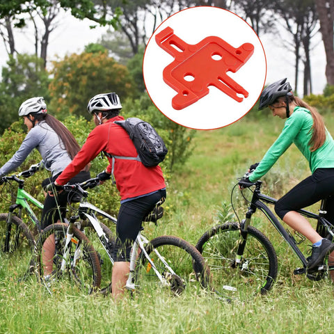 Cyclists with MTB bikes, inset of 4 Piece Bicycle Brake Spacer Set For Disc Brakes And Hydraulic Systems, lightweight plastic spacer