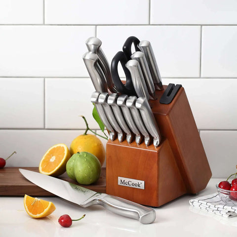 German Stainless Steel Kitchen Knife Set With Built In Sharpener in block, cherry wood, high carbon knives on kitchen counter.