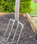Traditional Stainless Steel Border Fork For Aerating Weeding And Digging With Comfortable Wooden Handle Heavy Duty Garden Tool in soil