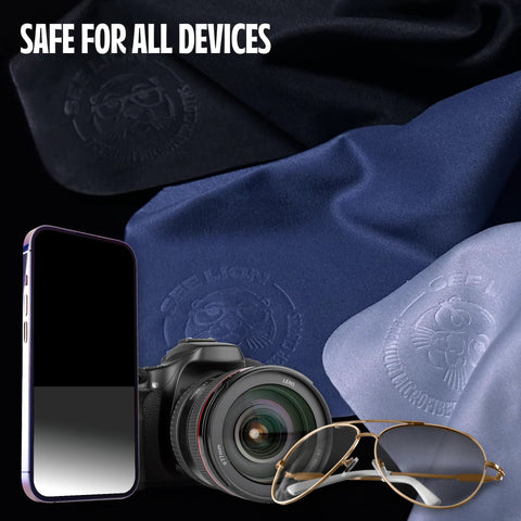 Cellhelmet See Lion Swipes microfiber cloths, black and navy, 2-pack, shown with phone, camera, and glasses.