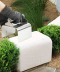 Person using Ergonomic Stainless Steel Curb Trowel Edger For Concrete Edging And Curbing, Compact 4x6x4 Inch Hand Tool on stone